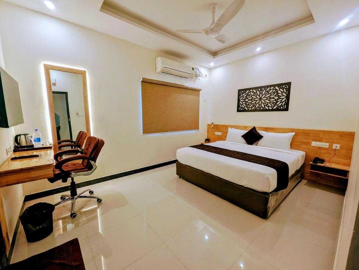 Отель Tpc Camphor Tiruchirappalli Экстерьер фото
