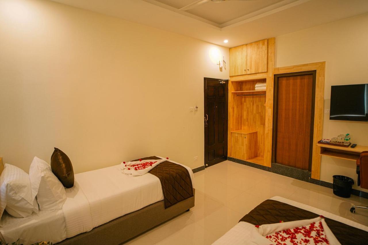 Отель Tpc Camphor Tiruchirappalli Экстерьер фото